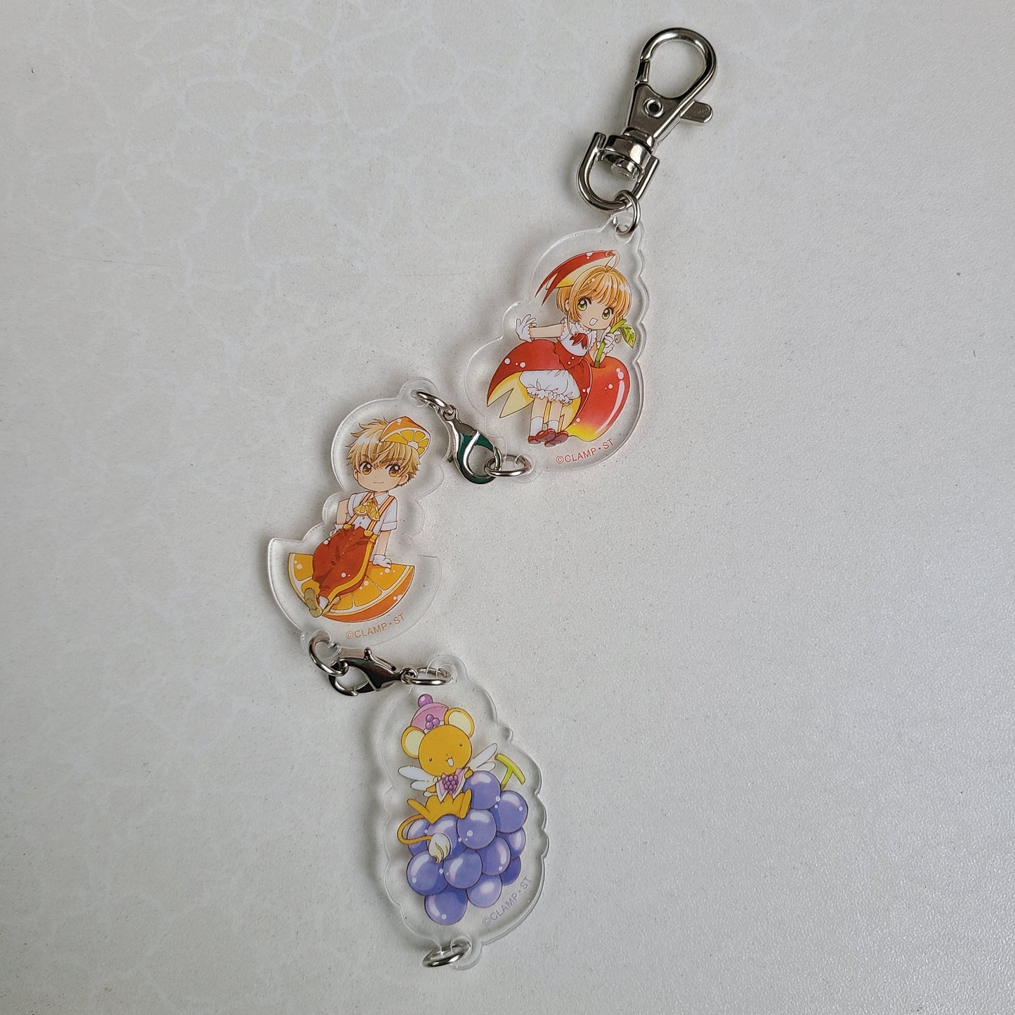 Colgante acrílico Sakura x Syaoran x Kero