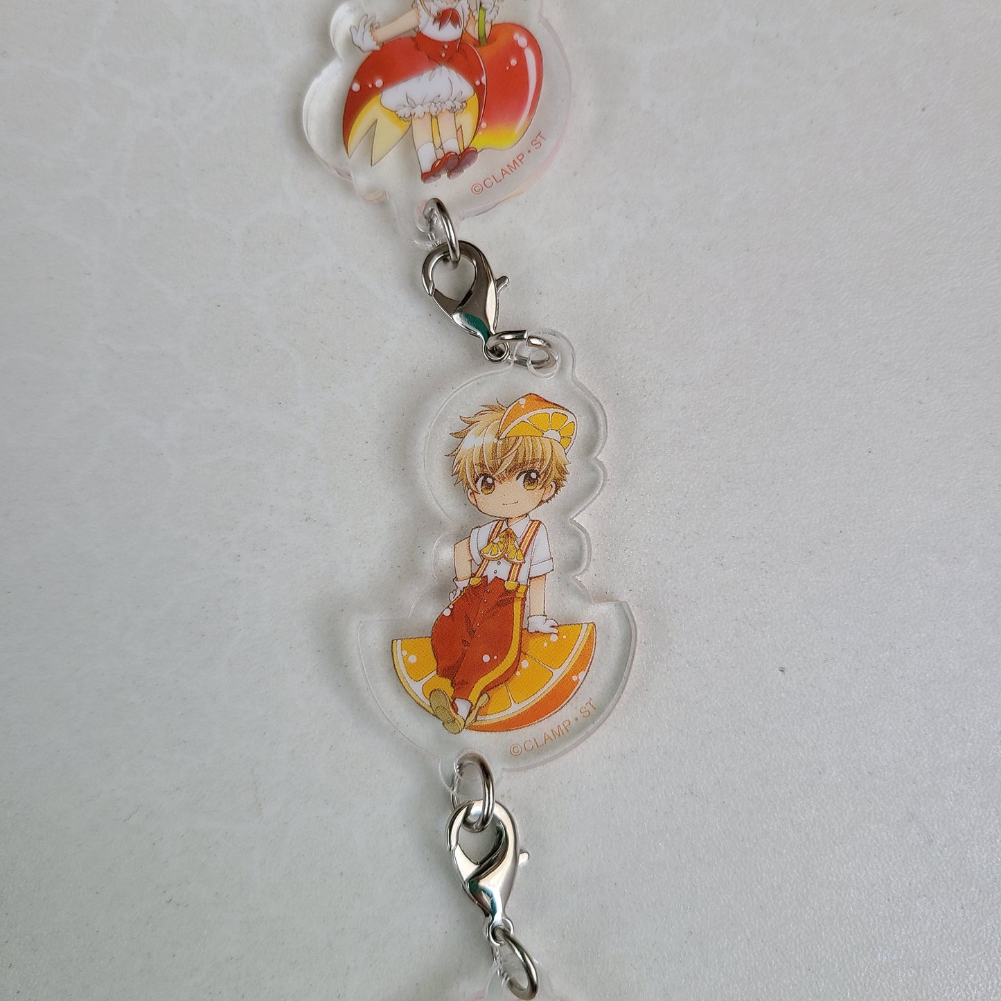 Colgante acrílico Sakura x Syaoran x Kero