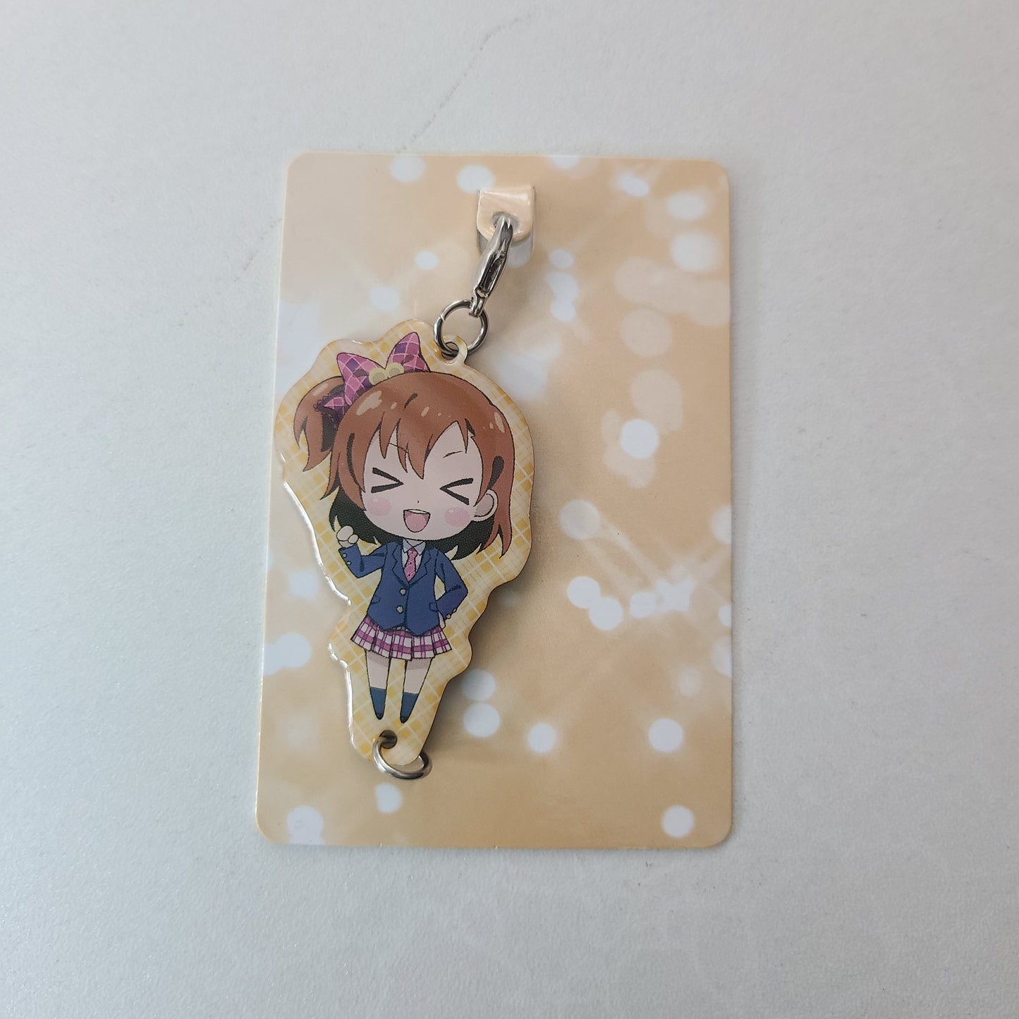 Colgante metálico Honoka Kousaka
