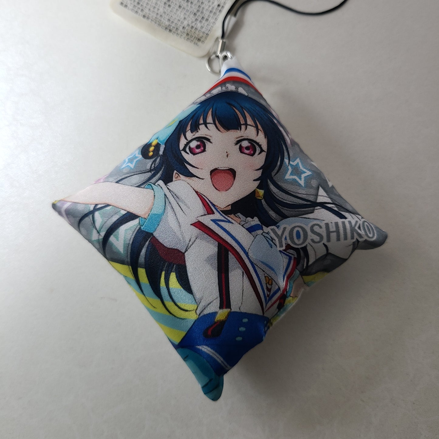 Strap cojin Yoshiko Tsushima
